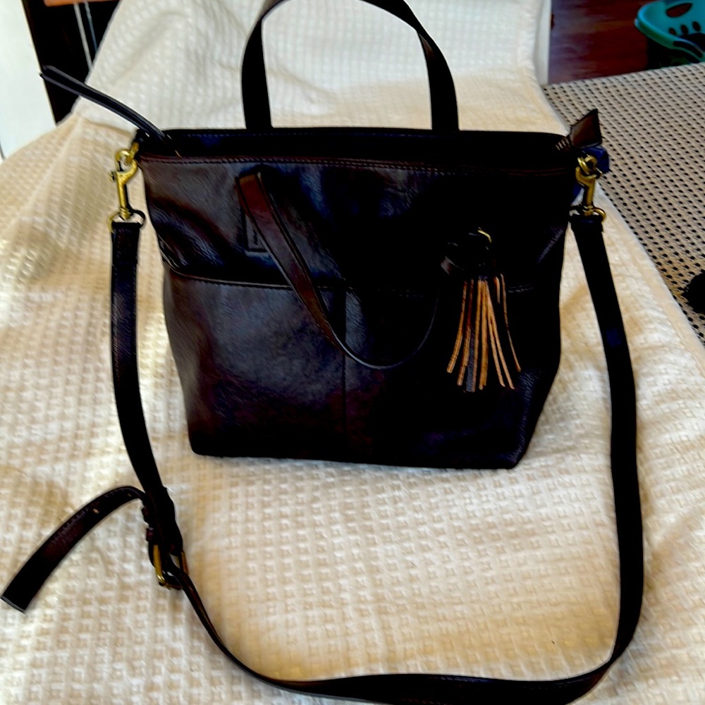 Brown leather handbags for sale lot of internal pockets.